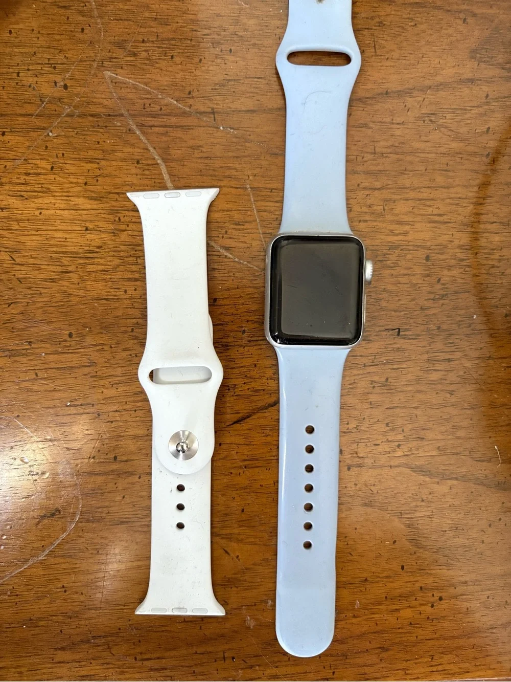Apple Light Blue Smartwatch with White Silicone Replacement Band